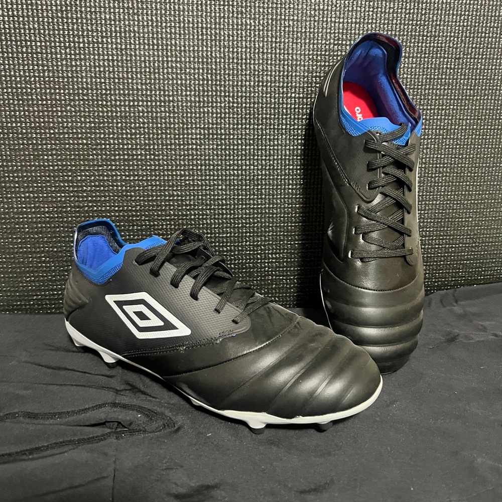 The Umbro Tocco Premier FG Black and Blue